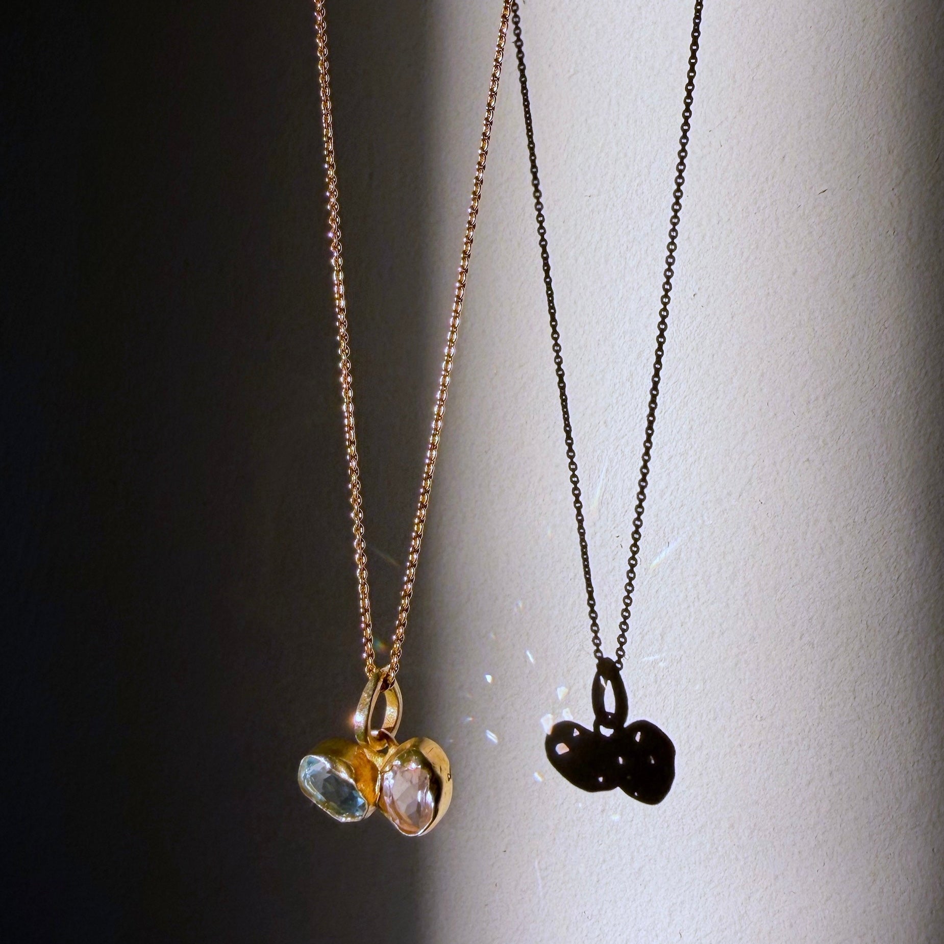 Blue topaz and rose quartz toi et moi pendant in gold dipped sterling silver