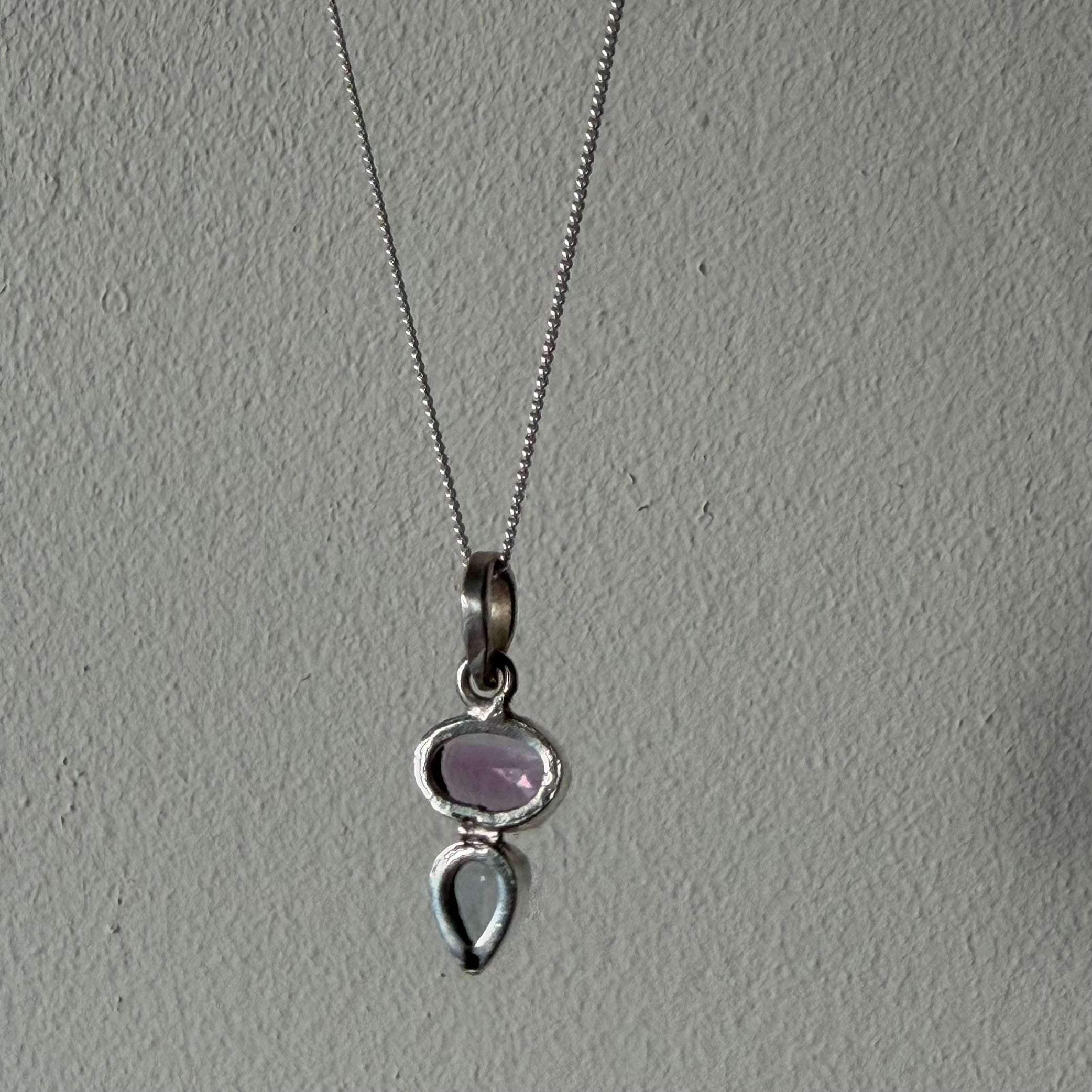 open back of amethyst and blue topaz drop silver pendant