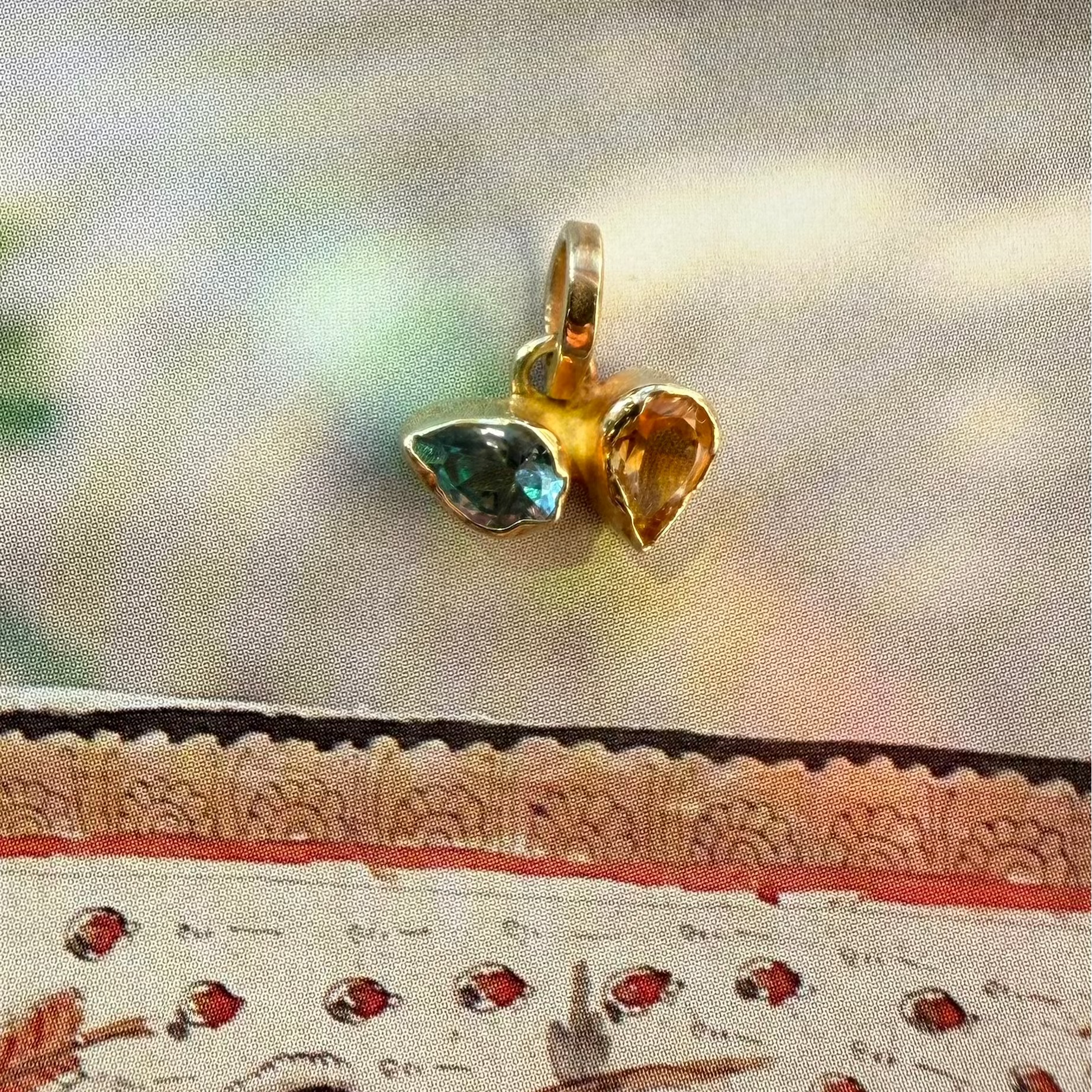 blue topaz and citrine gold pendant handcrafted in Bali