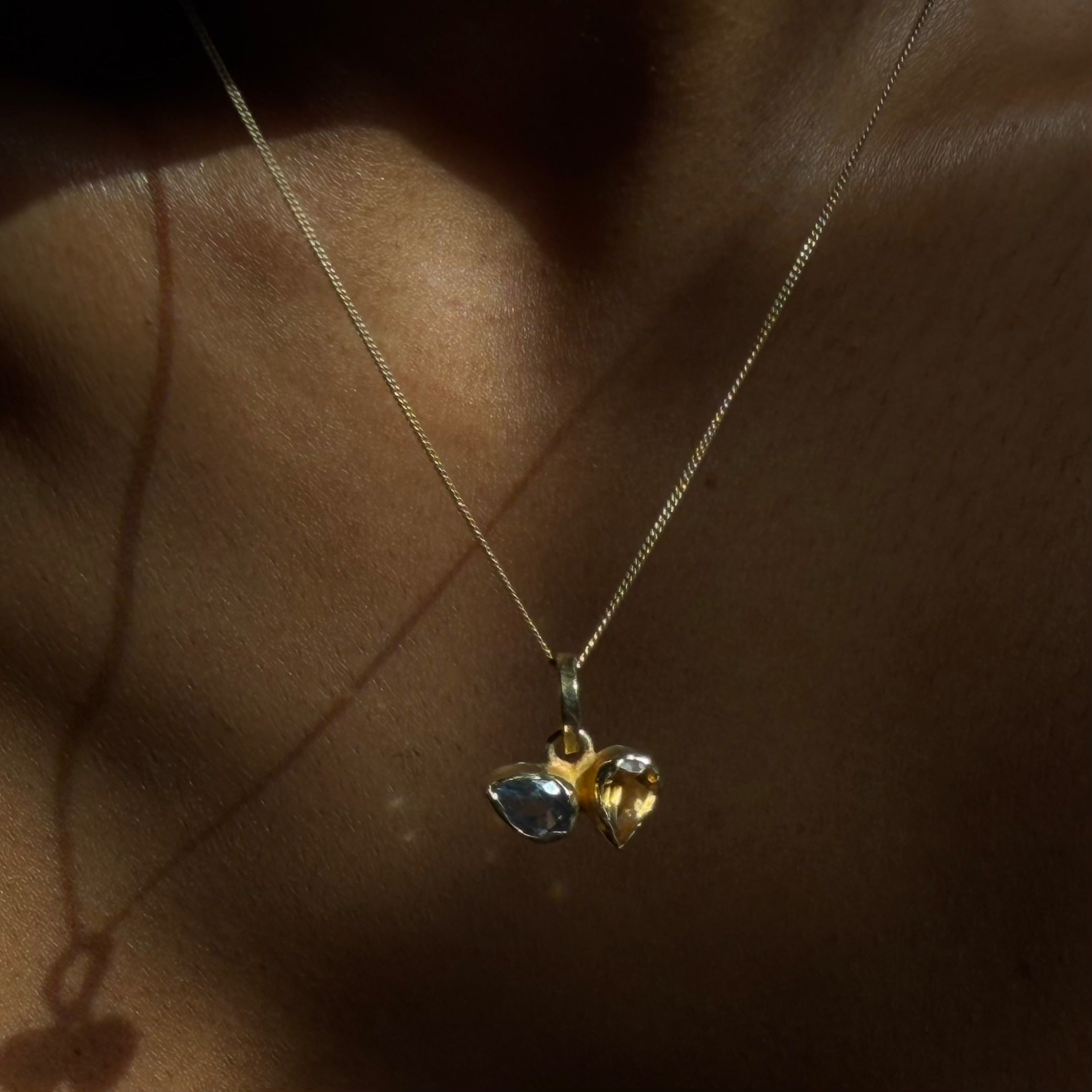 blue topaz and citrine pear toi et moi gold necklace on wearing