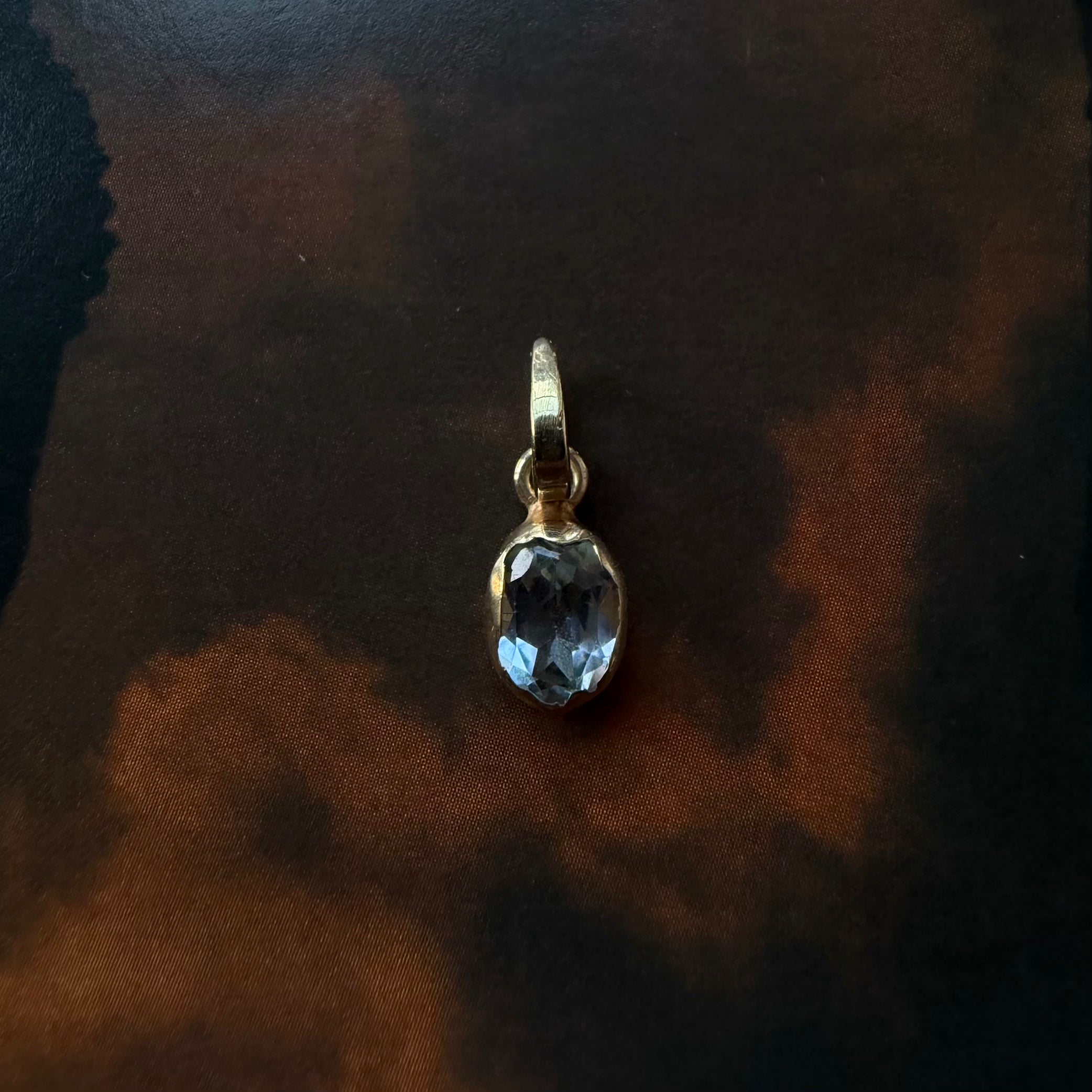 gold dipped sterling silver blue topaz pendant handcrafted in bali