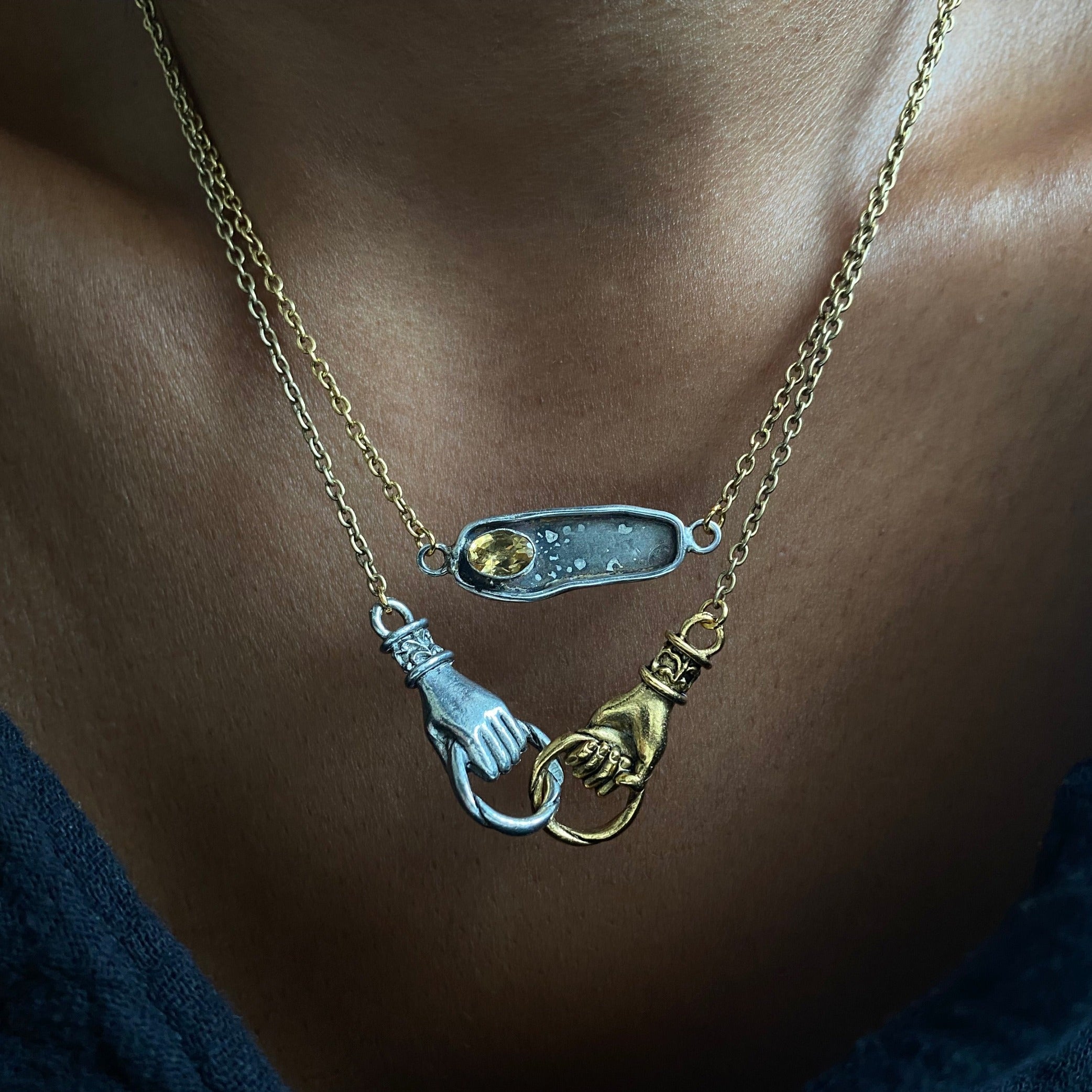 mixed metal unity necklace