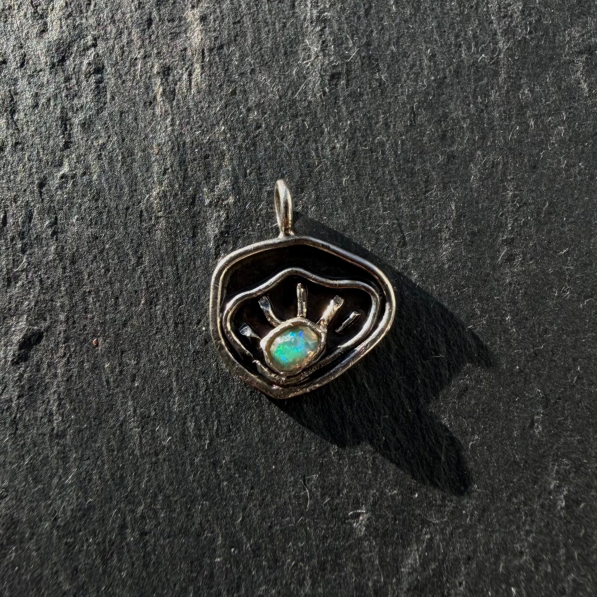detail sterling silver evil eye shell pendant with opal gemstone