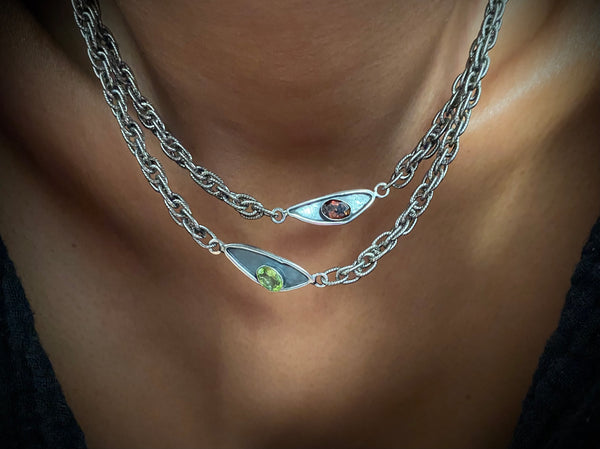 Peridot and tourmaline peace necklaces 