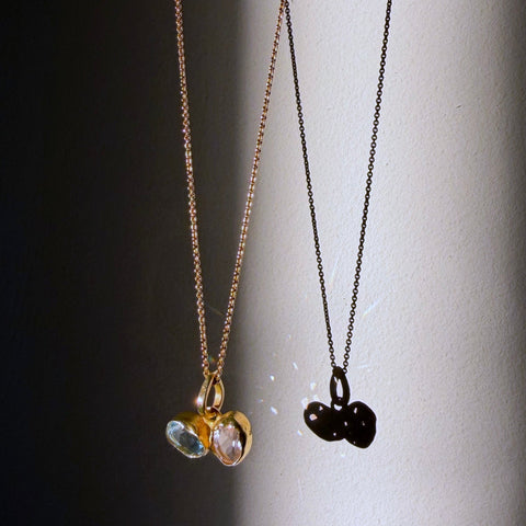 Blue topaz and rose quartz toi et moi pendant in gold dipped sterling silver