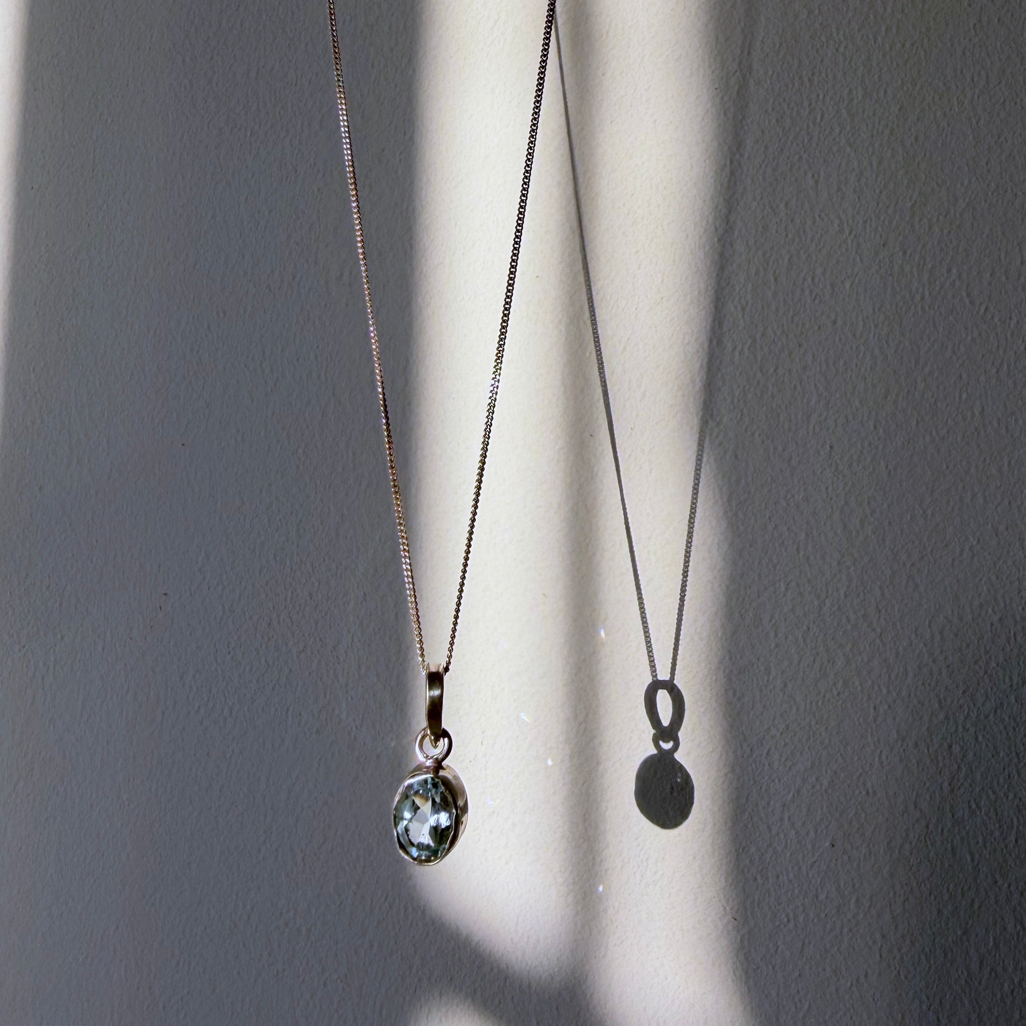 blue topaz sterling silver pendant in daylight
