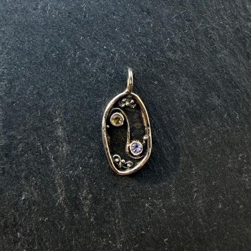 Handcrafted sterling silver Yin Yang talisman pendant with citrine and amethyst gemstones