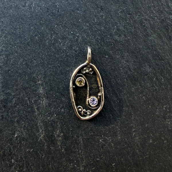 Handcrafted sterling silver Yin Yang talisman pendant with citrine and amethyst gemstones