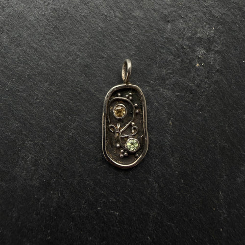 Handcrafted sterling silver Yin Yang talisman pendant with citrine and peridot gemstones