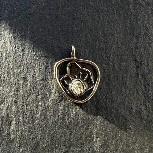Handcrafted sterling silver evil eye shell pendant with pyrite gemstone