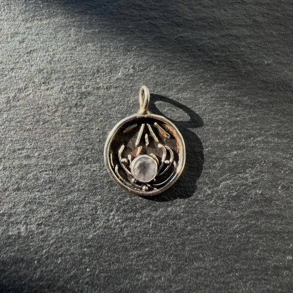 Handcrafted sterling silver lotus pendant with rose quartz gemstone