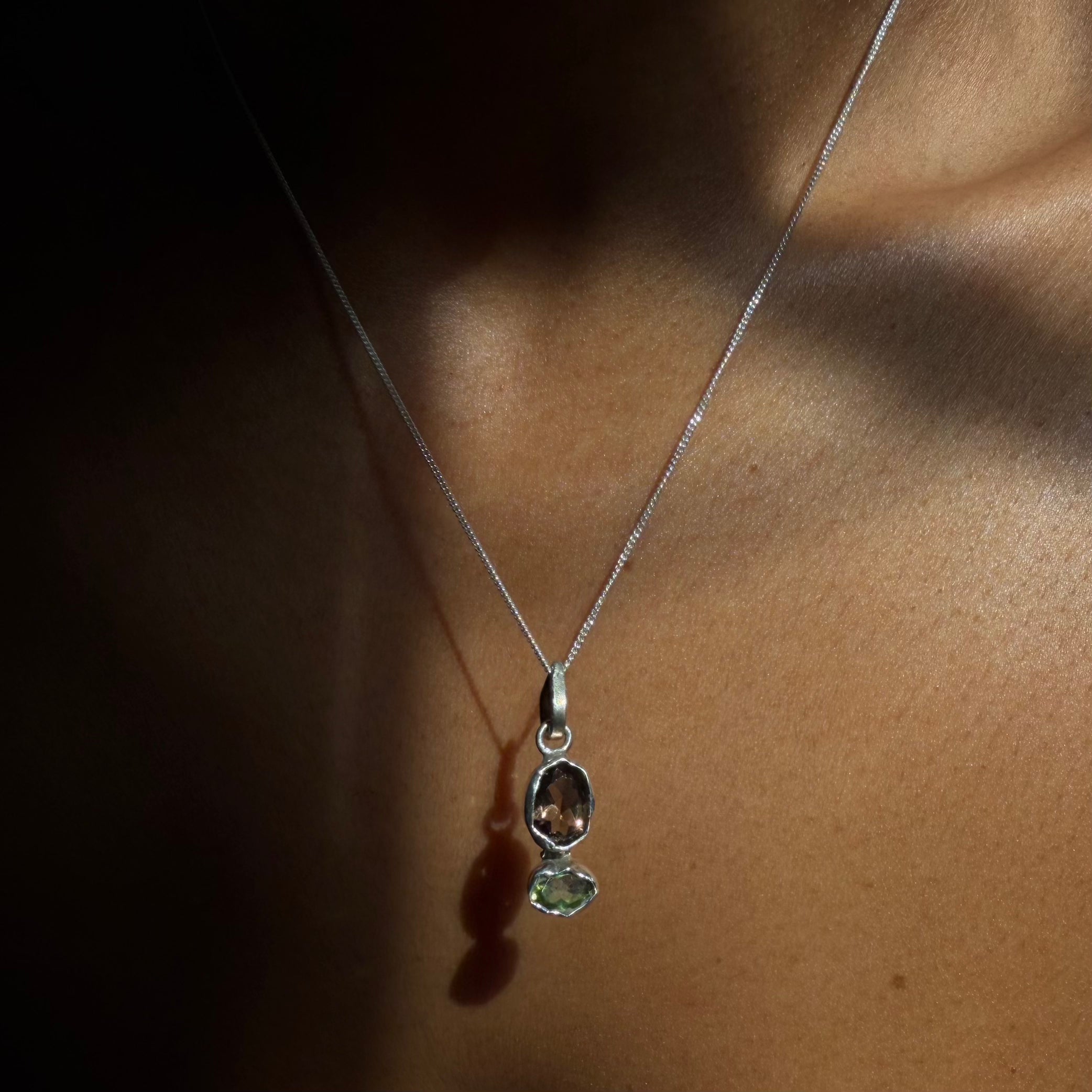 smoky quartz peridot sterling silver pendant on model