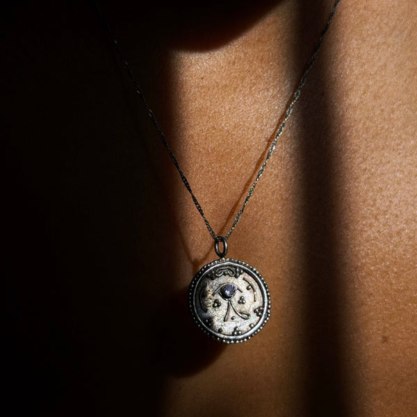 tanzanite eye of ra silver necklace on wearing