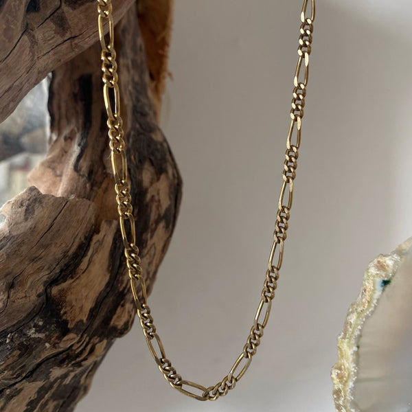 gold figaro necklace