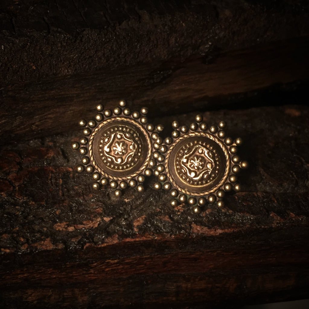 ornate gold studs