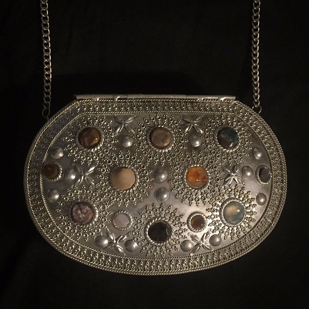 silver metal stone clutch