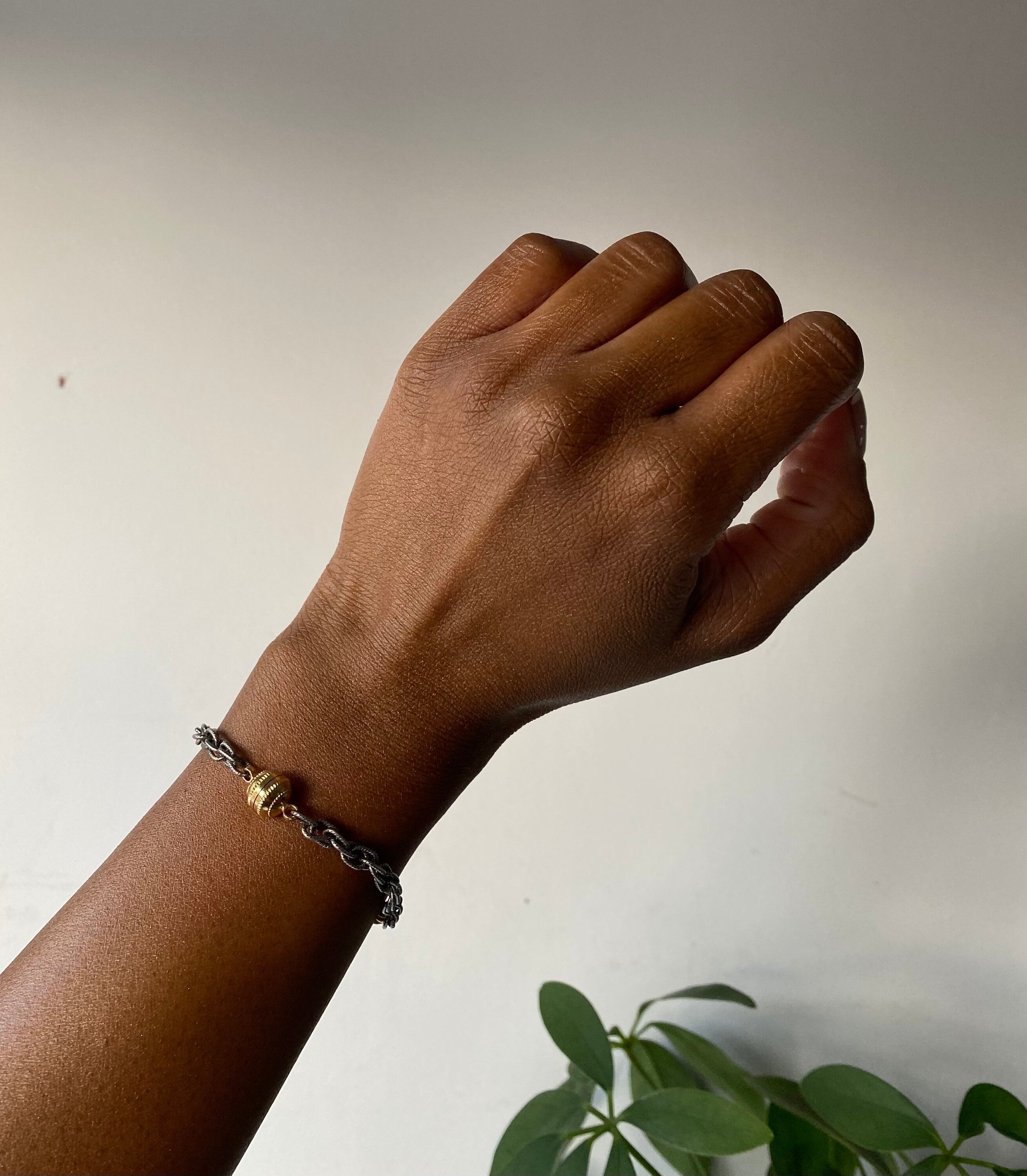 mixed metal hands bracelet