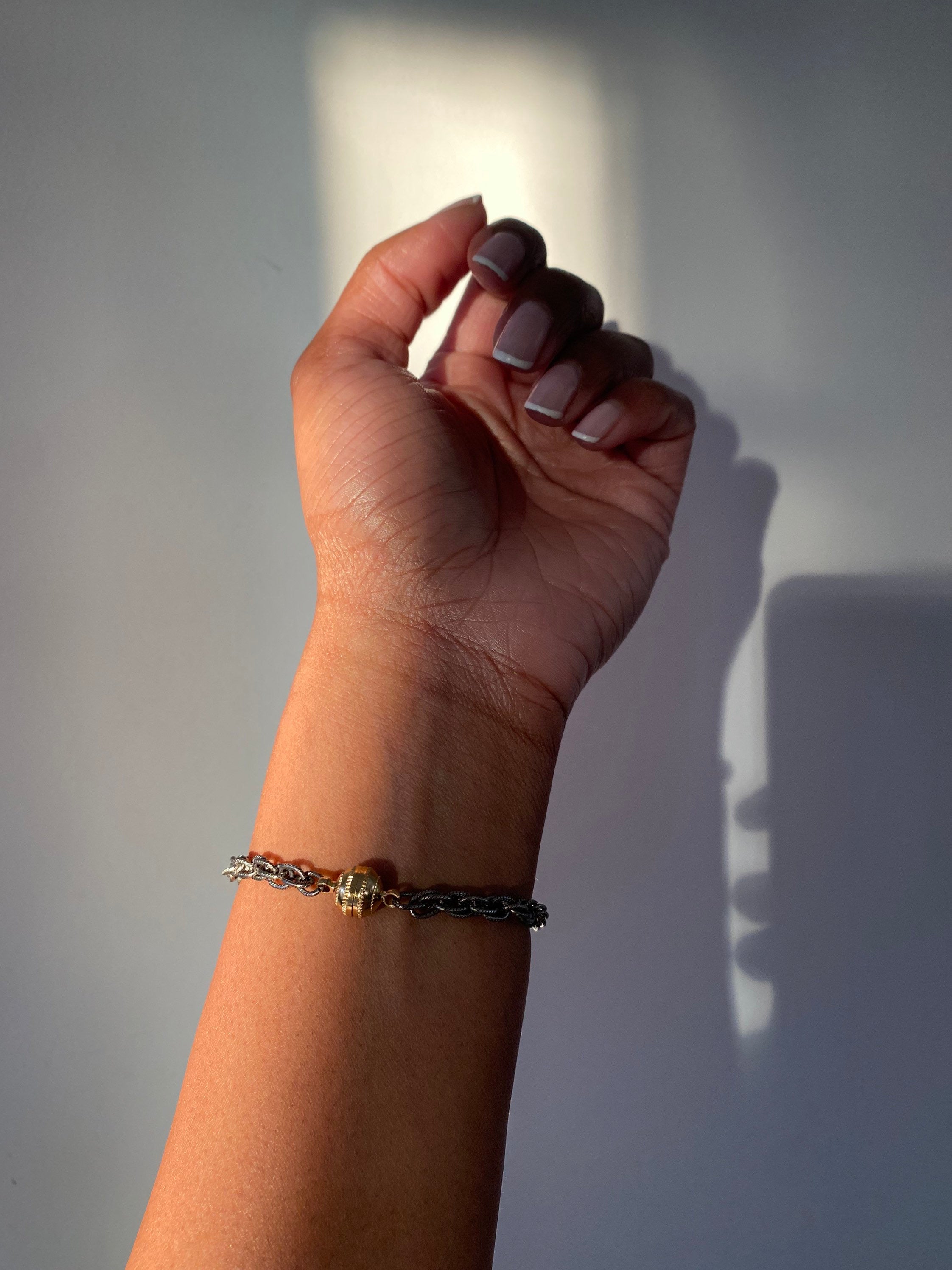 Mixed Metal Interlocking Hands Bracelet