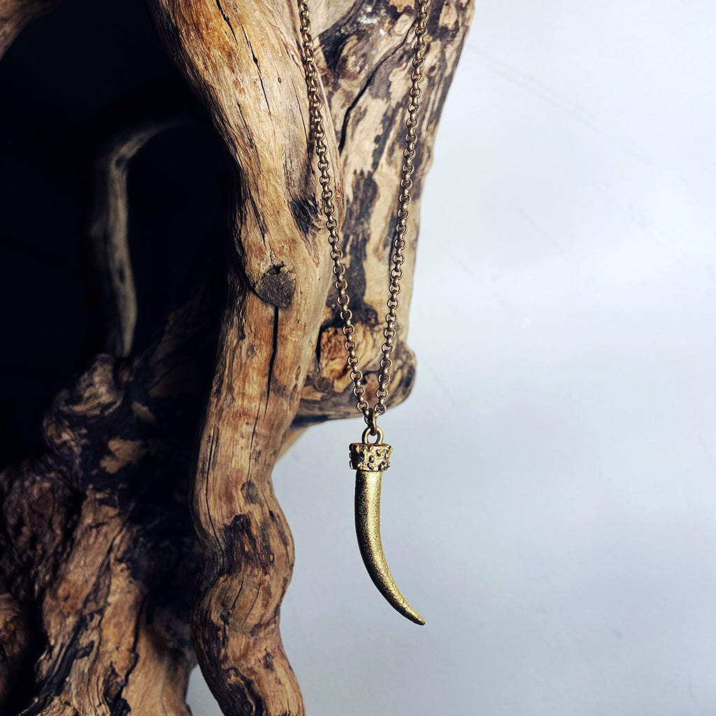 antique gold tusk necklace